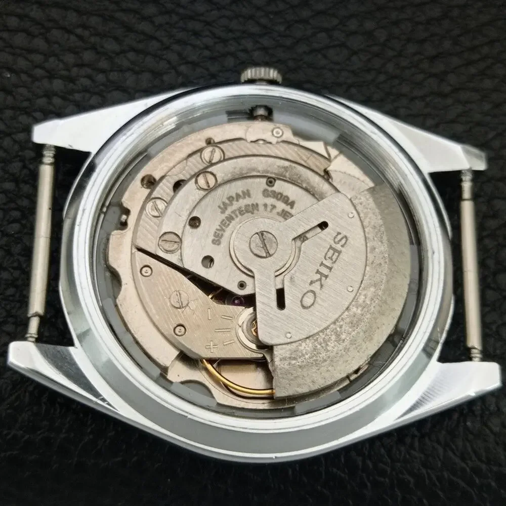 Vintage 1976 Seiko Automatic Mens Silver Watch W/daydate & Black accents